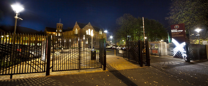 College gates at night