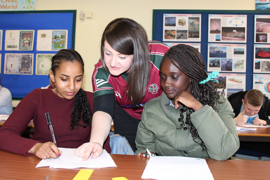 St Mary's student volunteer helping out at Easter School