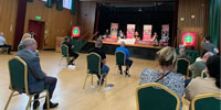 Socially distanced audience and panel in attendance during the Féile discussion on Legacy