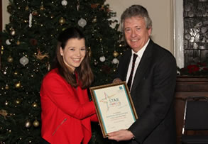 GTCNI Star Award to high-achieving BEd Primary graduate - winner Michaela Mulholland presented by Gerry Devlin