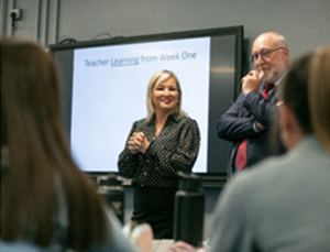 Michelle O'Neill and Professor Peter Finn in one of the classes during her visit.