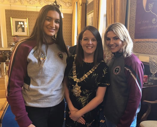 Ranch Ladies Football team members Méabh McGleenan and Saorlaith Kearney with Belfast Lord Mayor Rt Hon Nuala McAllister