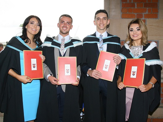 A group of St Mary’s students with their degree certificates 